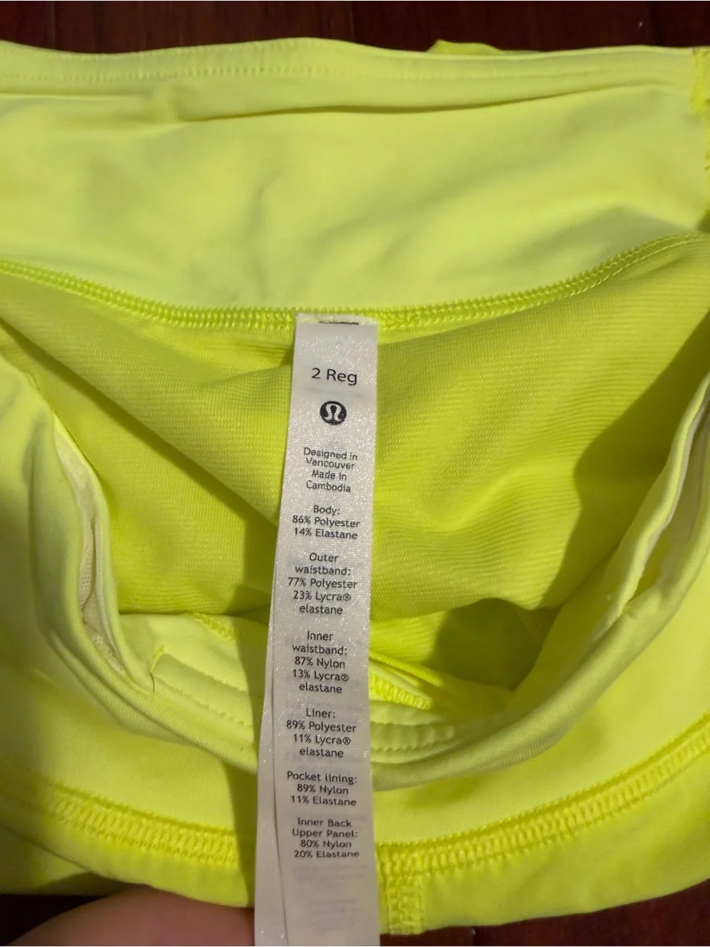 Women’s Lululemon  Highlight Yellow Speed Up Low-Rise Lined Shirts 2.5” - size 2